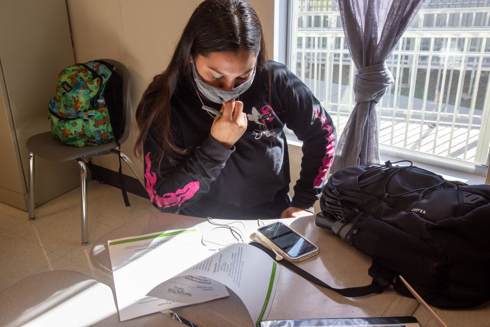 Student working on her desk